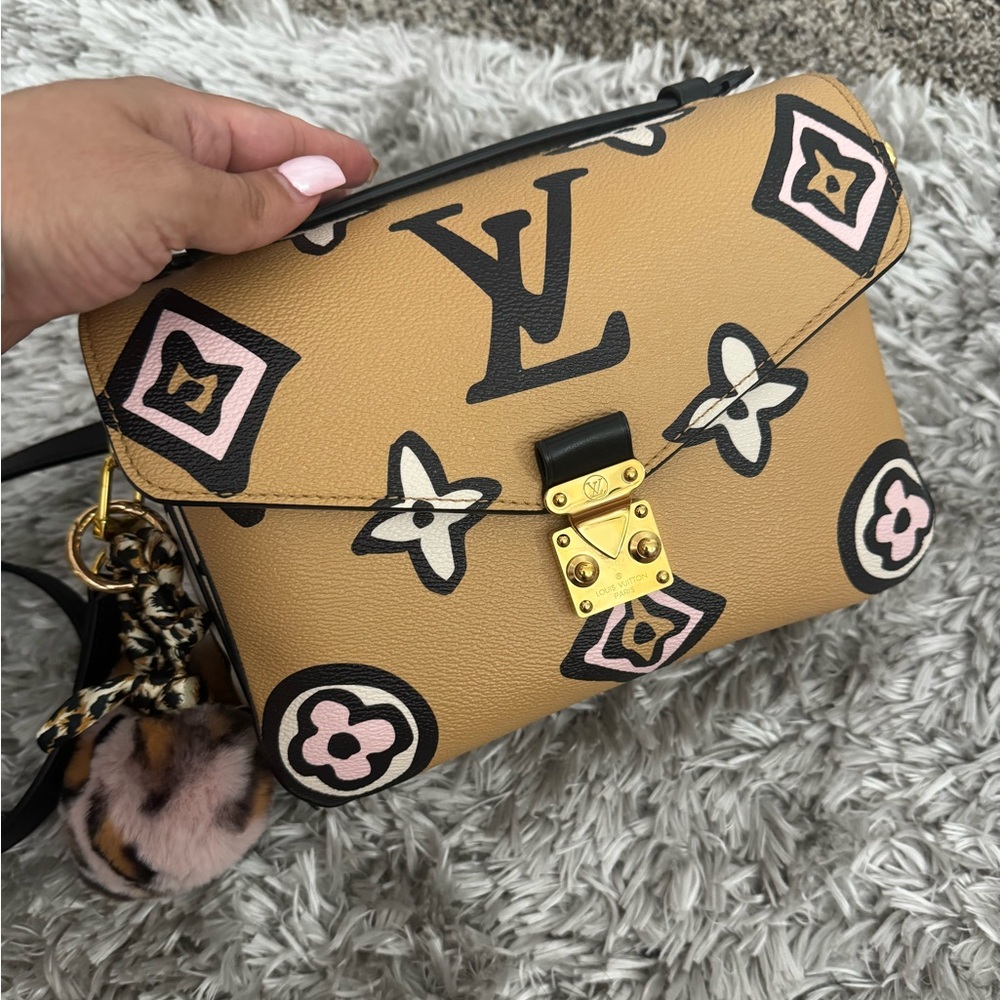 Louis Vuitton wild at heart pochette Métis